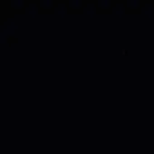 Dark granular texture with scattered points of light, resembling a night sky, dominated by black and subtle variations in tone, photographic composition.